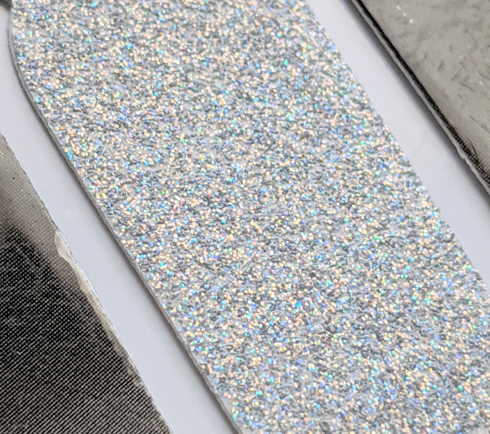 Envolturas para uñas con purpurina gris y plateada